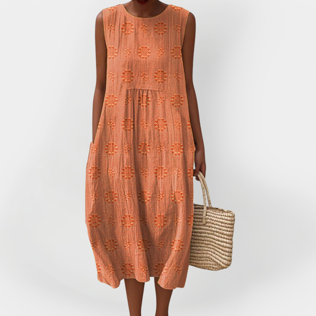 Elegantna brezrokavna bombažna obleka z žepi