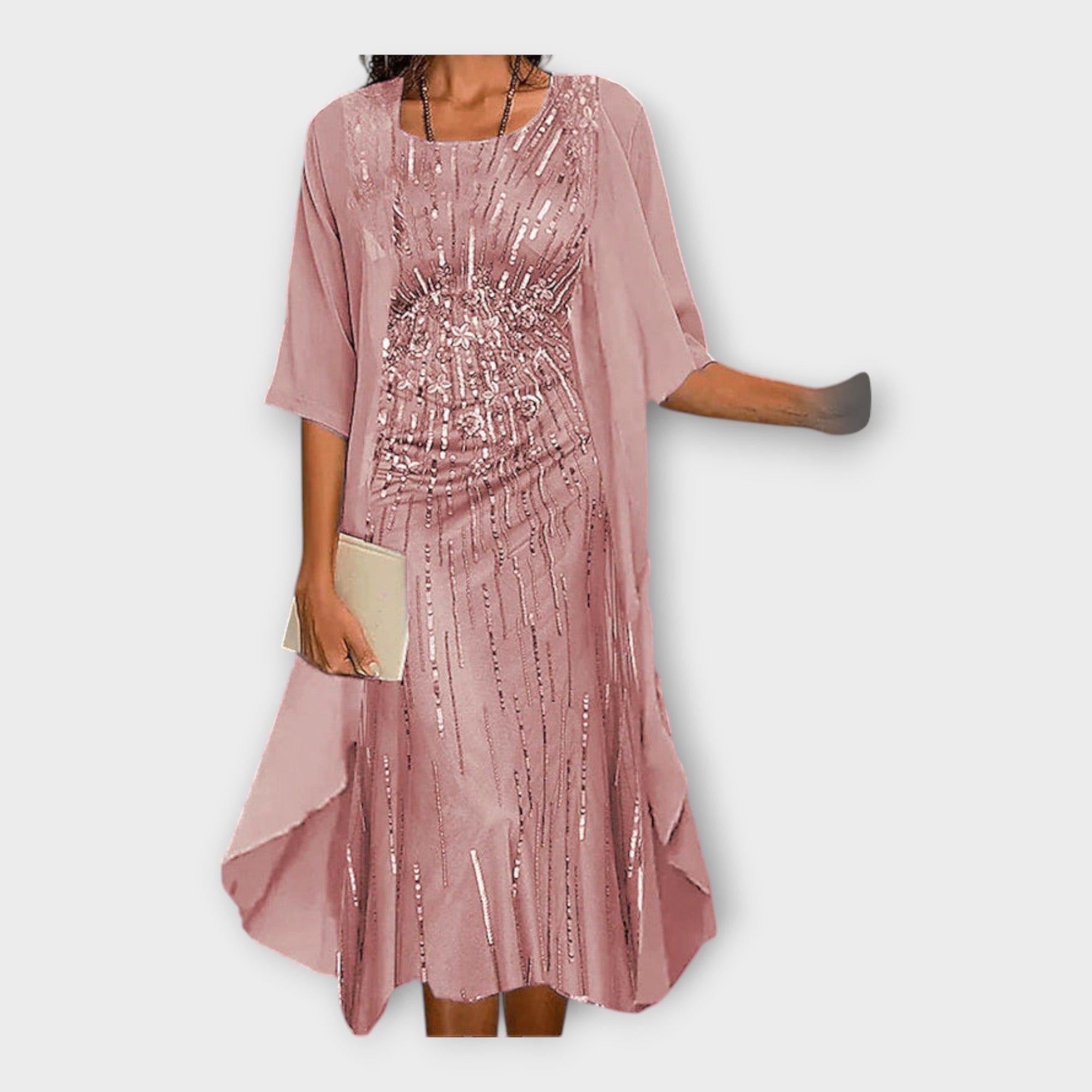 Zračna obleka s zunanjim jopičem in vzorčastim dizajnom